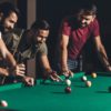 men playing pool