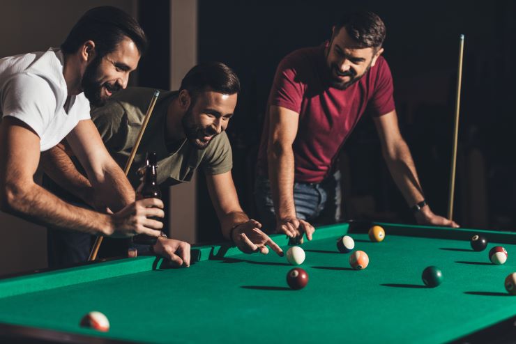 men playing pool