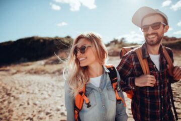 travel couple beach stock.